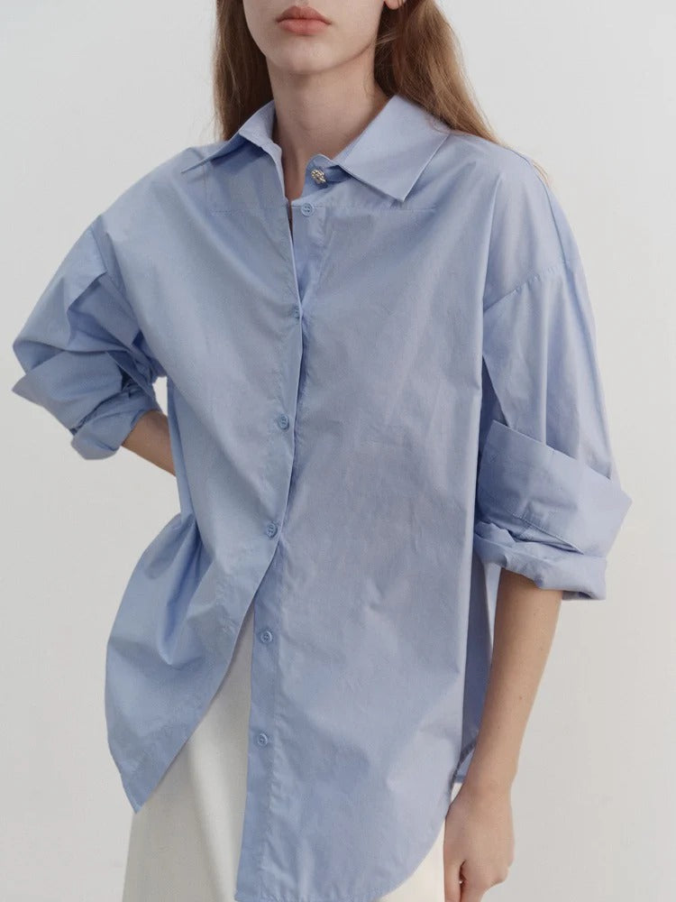 “Classic Oversized White Blouse
