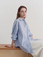 “Classic Oversized White Blouse