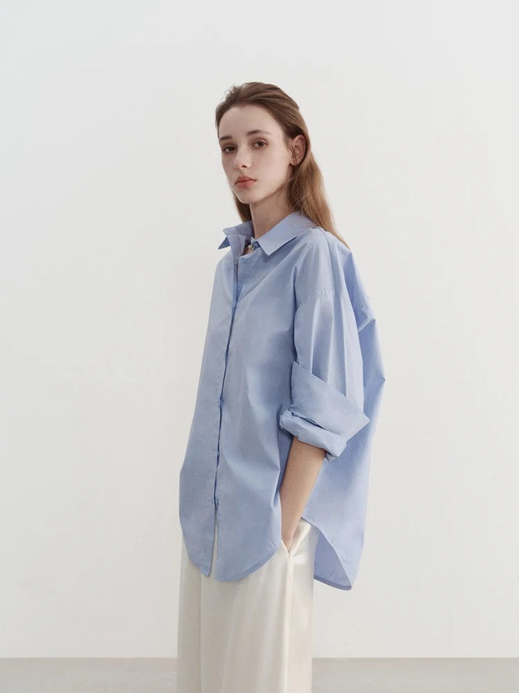 “Classic Oversized White Blouse
