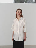 “Classic Oversized White Blouse