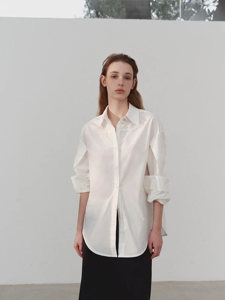 “Classic Oversized White Blouse